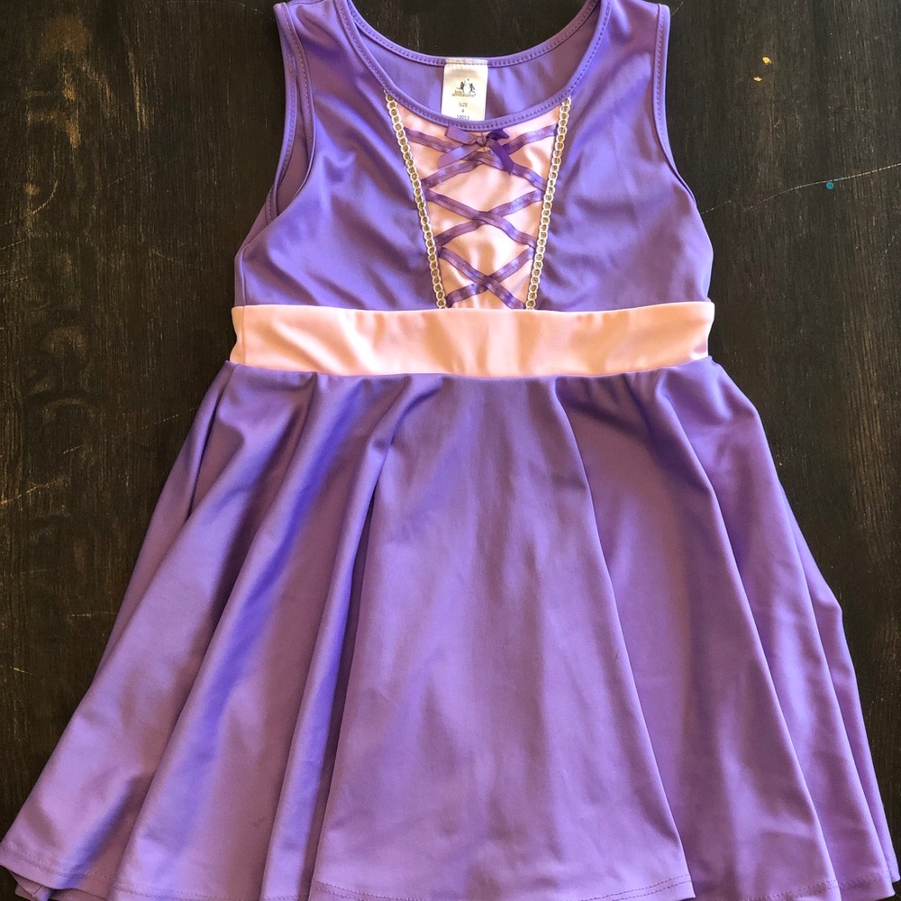 Little Adventures Rapunzel Twirl Dress. Purple and pink with gold trim.